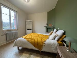 Postel nebo postele na pokoji v ubytování Maison La Lensoise - 4 chambres - Stade Bollaert