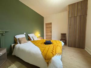 Postel nebo postele na pokoji v ubytování Maison La Lensoise - 4 chambres - Stade Bollaert