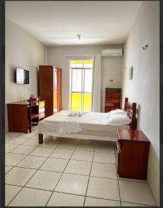 Ένα ή περισσότερα κρεβάτια σε δωμάτιο στο Hotel e Flat Sobral Mundi