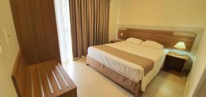 Postel nebo postele na pokoji v ubytování Ilhas do Lago Eco Resort - Central de Reservas + 164 fotografií