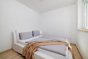 Postel nebo postele na pokoji v ubytování Villa Katarina + 37 fotografií