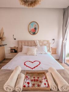 A bed or beds in a room at Bohemian Rhapsody