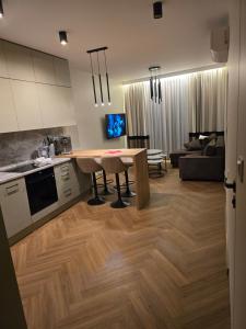 Kuchyň nebo kuchyňský kout v ubytování Apartament Lublin Wieniawska