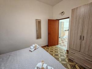 Postel nebo postele na pokoji v ubytování Almiva alloggio confortevole vicino alla Scala dei Turchi