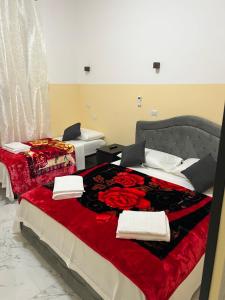 Postel nebo postele na pokoji v ubytování RATTAZZI ROMA CENTRo