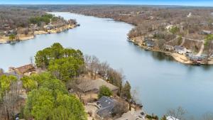 an aerial view of a large river with houses at Dock Holiday - Hot Tub - Private Dock in Bella Vista