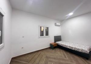 Postel nebo postele na pokoji v ubytování فيلا حديثة قرب السفارة الامريكية Modern villa near the American Embassy in Nouakchott + 14 fotografií