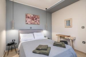 Postel nebo postele na pokoji v ubytování Casa Katrine