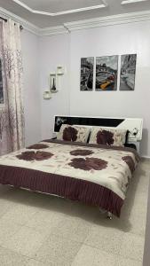 Postel nebo postele na pokoji v ubytování An entire house in Béchar منزل كامل في بشار