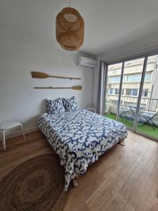Postel nebo postele na pokoji v ubytování Appartement à 100 m de la mer !