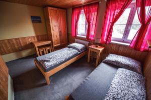 Postel nebo postele na pokoji v ubytování Chata Skalka