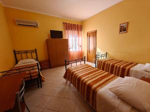 Letto o letti in una camera di Al Cedir