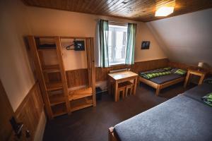 Postel nebo postele na pokoji v ubytování Chata Skalka