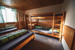 Postel nebo postele na pokoji v ubytování Chata Skalka