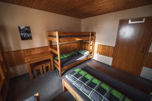 Postel nebo postele na pokoji v ubytování Chata Skalka