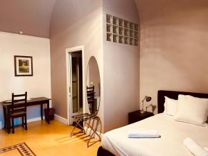 A bed or beds in a room at Acquadellarte B&B