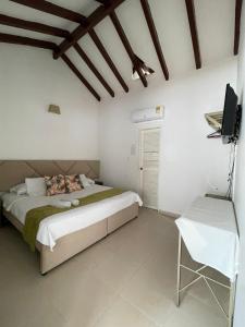 Postel nebo postele na pokoji v ubytování Dorado hotel boutique