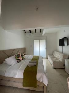 Postel nebo postele na pokoji v ubytování Dorado hotel boutique