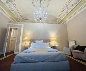 A bed or beds in a room at Acquadellarte B&B