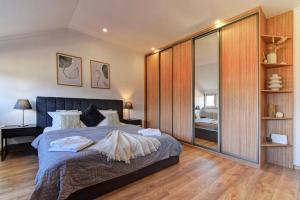 Posteľ alebo postele v izbe v ubytovaní Beautiful Apartment Dlouhá