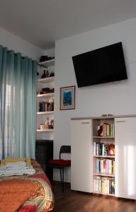 Un televizor și/sau centru de divertisment la A Casa di Vale