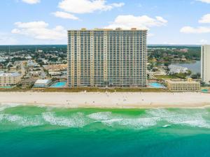 an aerial view of a hotel and the beach at 20th-floor condo with Gulf views, resort amenities & 2 lagoon-style pools in Panama City Beach
