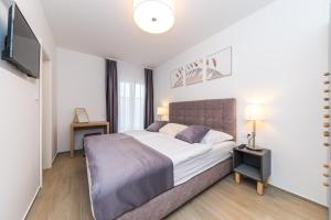 Postel nebo postele na pokoji v ubytování Villa Leah