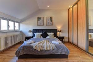 Posteľ alebo postele v izbe v ubytovaní Beautiful Apartment Dlouhá