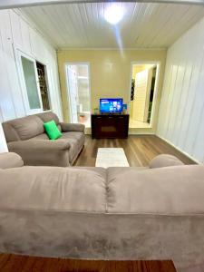 Μια τηλεόραση ή/και κέντρο ψυχαγωγίας στο Casa Amarela Balneário Camboriú +12 φωτογραφίες