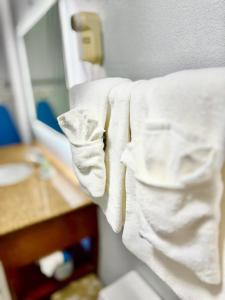 Postel nebo postele na pokoji v ubytování Vip inn and suites