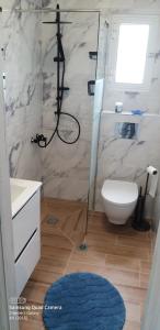 Bilik mandi di Apartament Słoneczny