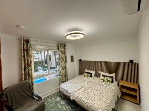 Postel nebo postele na pokoji v ubytování Apartamento Bulevar en Playa Albir