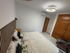 Postel nebo postele na pokoji v ubytování Apartamento Bulevar en Playa Albir