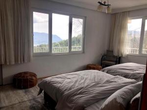 Ein Bett oder Betten in einem Zimmer der Unterkunft Cozy Mountain View House Near Olympos & Adrasan