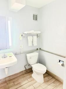Koupelna v ubytování Vip inn and suites