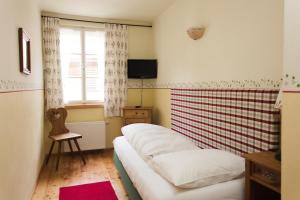 TV a/nebo společenská místnost v ubytování Hotel-Gasthof Weitgasser
