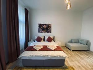 Postel nebo postele na pokoji v ubytování Moderní apartmán vedle divadla - Netflix, Wi-Fi zdarma