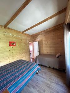 Postel nebo postele na pokoji v ubytování Cabaña los Gansos Playa Bosque Grill Wi-Fi TV