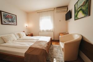 Letto o letti in una camera di B&B Passage