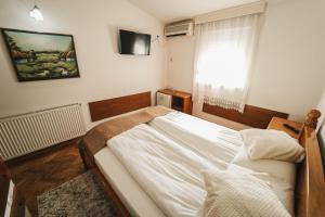 Letto o letti in una camera di B&B Passage