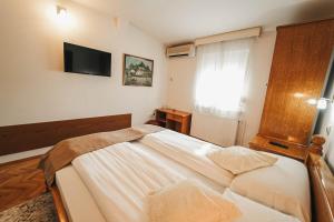 Letto o letti in una camera di B&B Passage