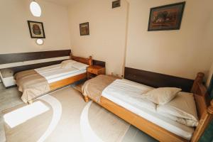 Letto o letti in una camera di B&B Passage