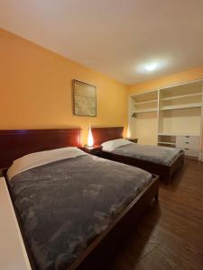 Postel nebo postele na pokoji v ubytování Huntley Inn + 19 fotografií