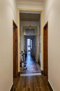 an empty hallway with a hallway leading to a room at Rio Vibes Hostel in Rio de Janeiro