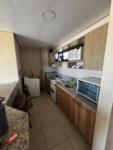 Køkken eller tekøkken på KARIRI BEACH_CUMBUCO BOUTIQUE APARTMENTS