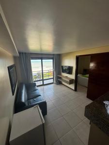 Et tv og/eller underholdning på KARIRI BEACH_CUMBUCO BOUTIQUE APARTMENTS