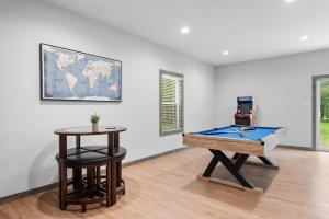 a room with a pool table and a stool at Twin Chalet 6 BDs Hot Tub Game Area and more in Albrightsville +77 photos