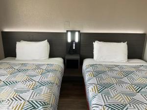 Ένα ή περισσότερα κρεβάτια σε δωμάτιο στο Motel 6-Odessa, TX +27 φωτογραφίες