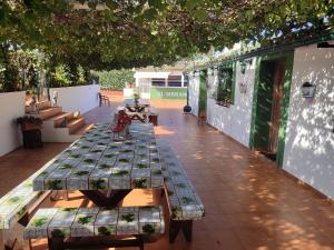 a patio with a table with money on it at Agroturismo El Serrano in Moratalla