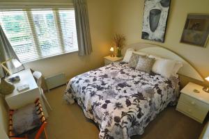 Postelja oz. postelje v sobi nastanitve Magpie Cottage Homestay Bed & Breakfast